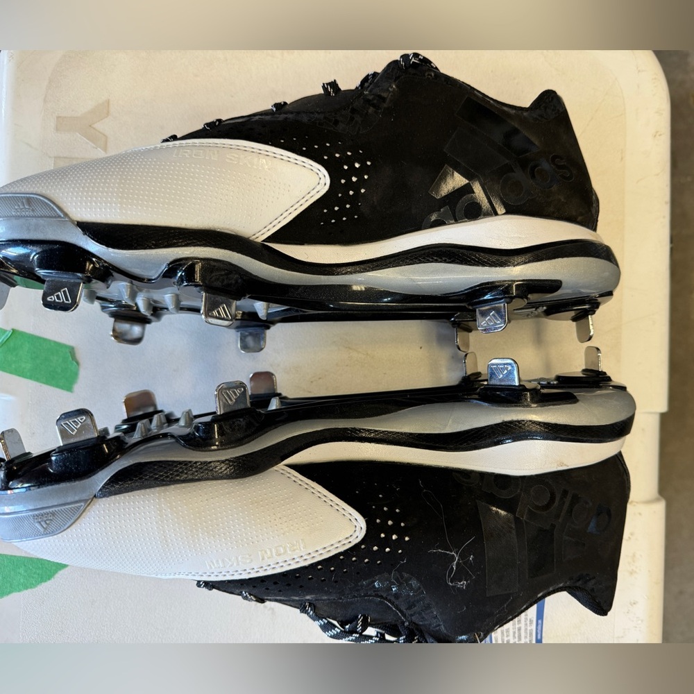 Woman’s new with tag size 6 Adidas metal softball cleats